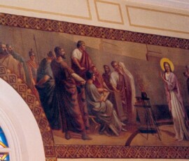 Sainte Philomène devant un tribunal.
Saint Philomena before a court.
